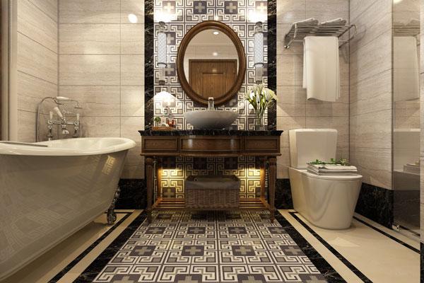 Phòng tắm với chi tiết gạch lát nền hoa văn nổi bật ở giữa như ngầm phân cách không gian